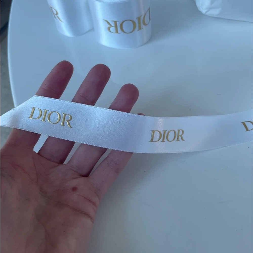 Dior Ribbon. White with gold writing 7.5 feet long